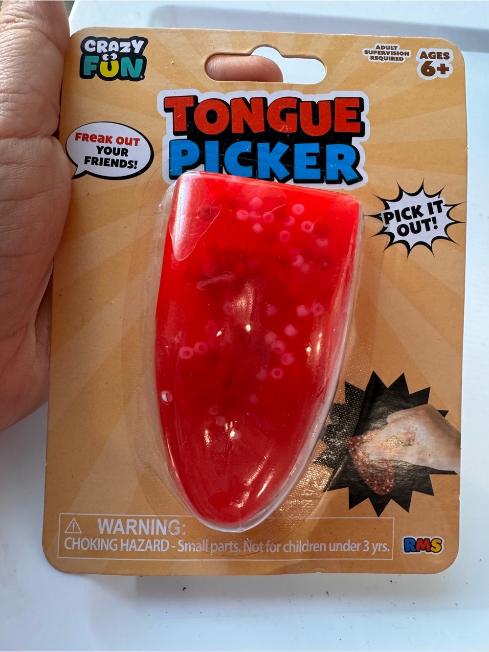 Red Tongue Picker Gag Toy